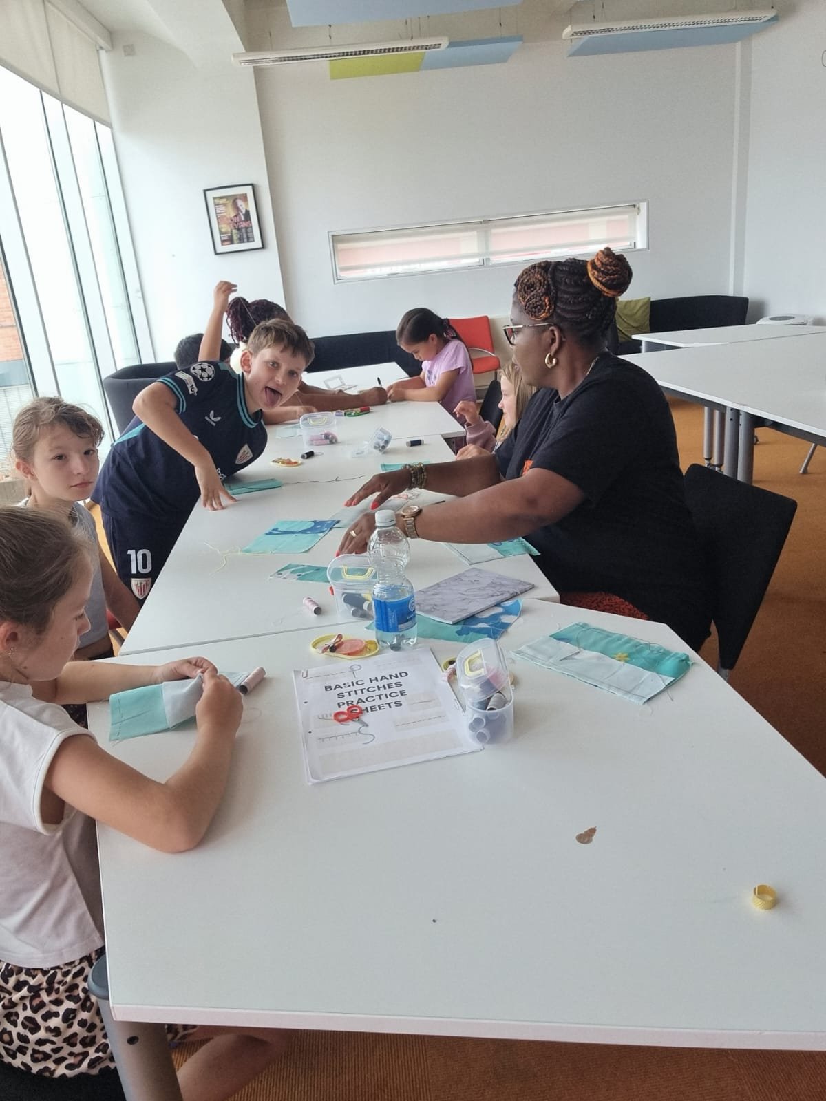 Children taking part in Junior Creators craft activities